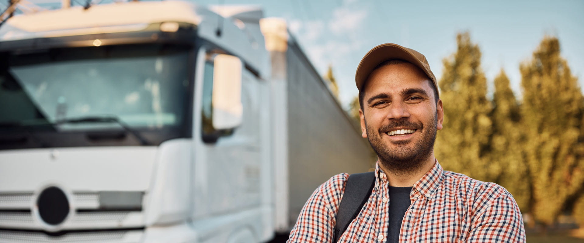 truck driver smiling at camera truck driver smiling at camera